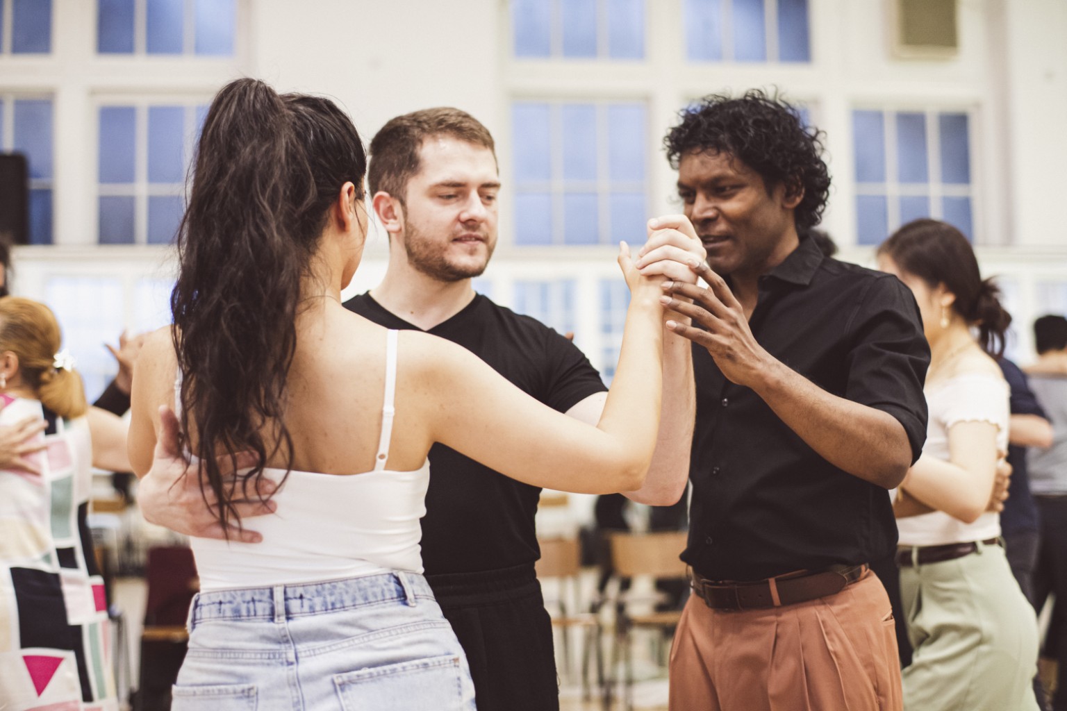 Tango teacher working with students