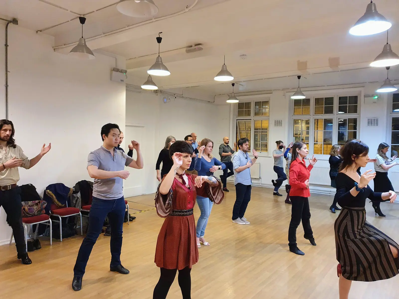 Students learning Argentine tango at Claremont Project in Angel, London